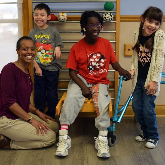 Center for Independence physical therapist with students